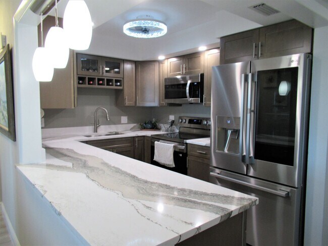 Building Photo - Waterfront 2/2 Furnished SEVEN month rental 55+ 8th Floor Point Brittany