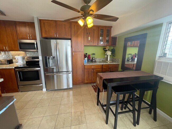 Building Photo - Fully furnished with amazing panoramic views.