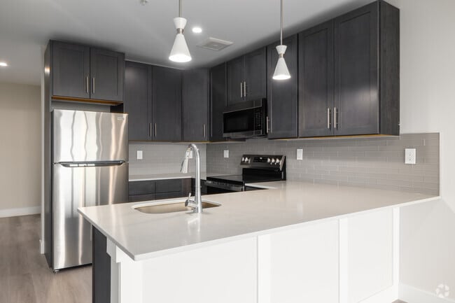 1BR, 2BA - 845SF - Kitchen - Spice Lofts