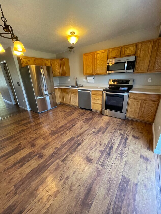 Kitchen with Stainless Steel Appliances - 1997 Oakcrest Cir