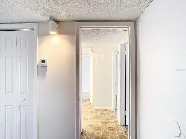 Building Photo - 2BR Condo Near UCF – All-Inclusive Living & Resort Amenities!