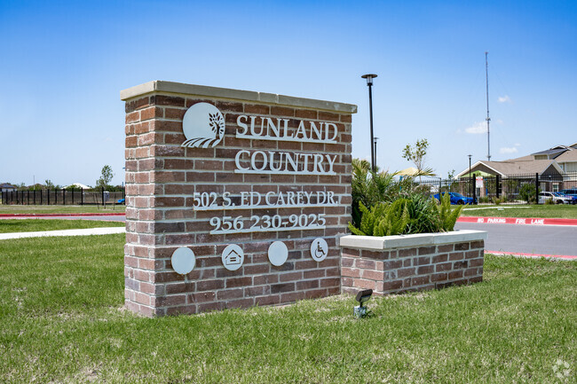 Entrada principal de Sunland Country Apartments - Sunland Country