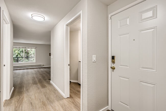 Foyer facing living room and laundry room on right - 19851 25th Ave NE