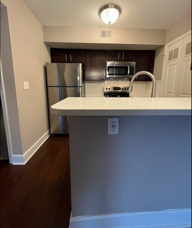Bartop with USB plug for ease working from home. - 425 W 9th St