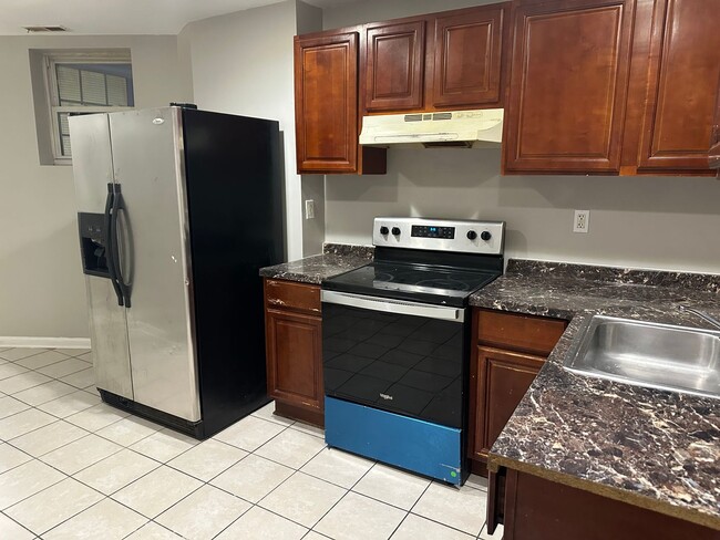 Building Photo - Spacious, Newly Renovated Home! Central Air! Finished Basement! W/D! Double Level Rear Deck! Avai...