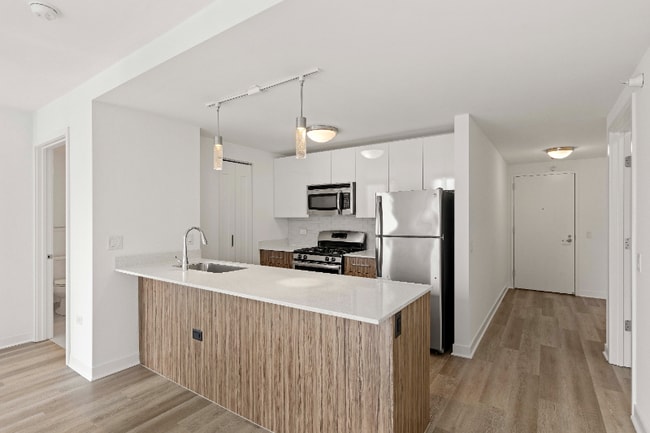 Building Photo - 411 W Wolf Point Plaza