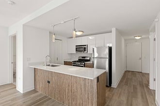 Building Photo - 411 W Wolf Point Plaza