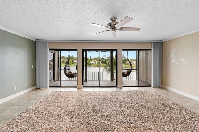 Building Photo - Lakefront lifestyle in this stunning 3-bed...