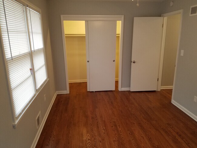 Large closets in both bedrooms, with an additional closet in the hallway. - 6617 Walrond Ave
