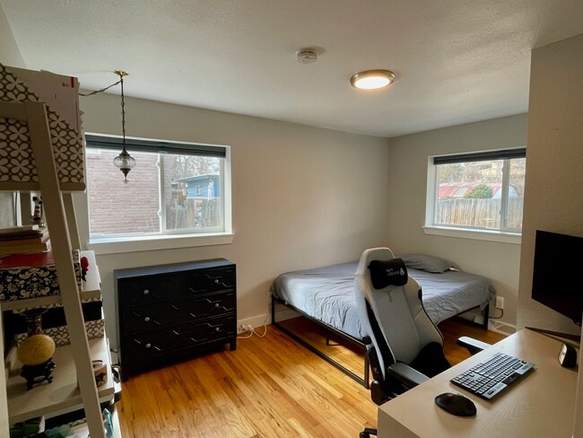 Upstairs Unit - Furnished Bedroom - 165 W Midway Blvd