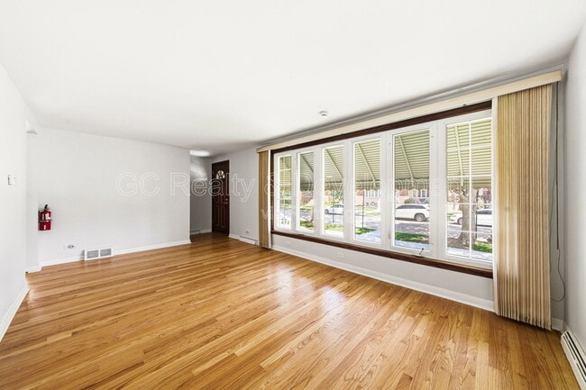 Building Photo - 5144 S Melvina Ave