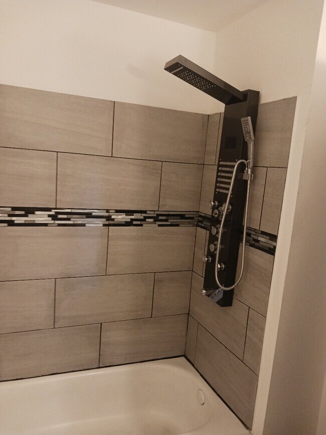 Remodel Bathroom new tiles and shower - 2210 W Washington Blvd