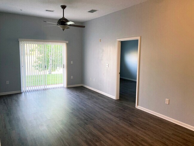 Building Photo - Spacious 3-Bedroom Condo with Pond Views &...