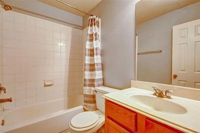 Building Photo - This one-story, three-bedroom, two bath ho...