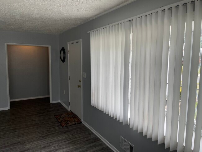 Living room/front door and window - 8730 Stockwell Rd