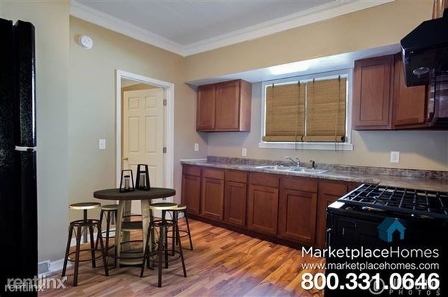 Building Photo - 4 br, 2 bath House - 215 N Oakley St