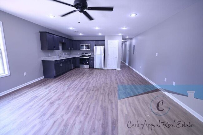 Foto del edificio - Move in special $650!! Luxury 2 bed, 1 bath duplex - new construction!! Washer and dryer and util...