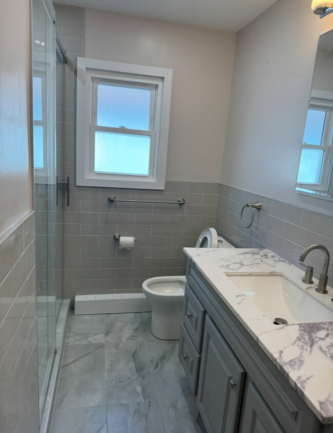 Brand New Full Bath - 1234 E 57th St