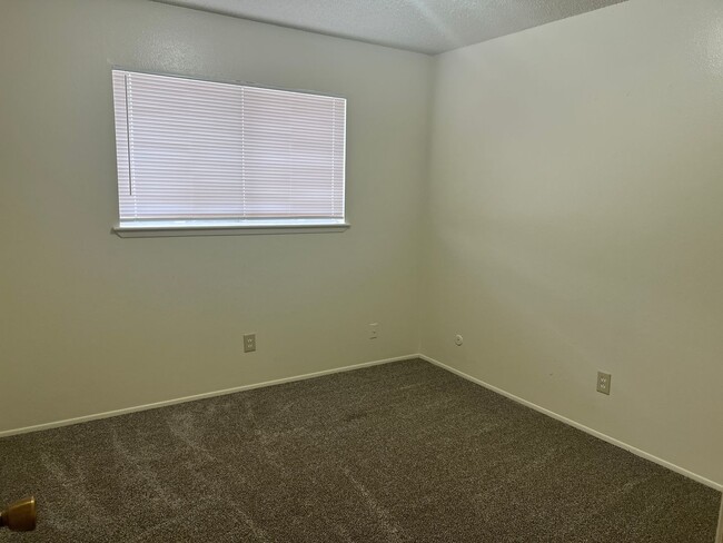 Building Photo - 3 Br, 1.75 Ba, 2 living areas, den with fi...