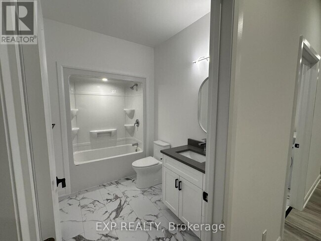 Photo du bâtiment - 293 Flat Rapids Rd