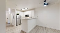 Step into a world of possibilities in this exquisitely reimagined space. The moment you enter, you're greeted by a flood of natural light and an open concept design that speaks to contemporary living. Sleek, light-toned flooring flows seamlessly throughout, creating a sense of continuity and spaciousness.

The heart of this home is the stunning kitchen, a culinary enthusiast's dream. Crisp white cabinetry reaches to the ceiling, maximizing storage and style. Stainless steel appliances, including a modern range and microwave, promise gourmet meals and easy entertaining. The elegant marble-look countertops provide ample workspace and a touch of luxury.

Each room has been thoughtfully designed to maximize comfort and functionality. Large windows invite the outdoors in, creating a bright and airy atmosphere. The bathroom is a spa-like retreat, featuring a contemporary vanity, sleek fixtures, and a bathtub perfect for relaxing soaks.

Step outside to your private balcony, an ideal spot for morning coffee or evening relaxation. This outdoor space extends your living area and provides a connection to nature.

Located in the desirable San Ramon area, this home offers the perfect blend of urban convenience and suburban tranquility. With its fresh, modern aesthetic and intelligent use of space, this property isn't just a home—it's a lifestyle upgrade. Whether you're a first-time buyer, downsizing, or seeking a pied-à-terre, this charming abode offers the canvas for your next chapter. Don't miss the opportunity to make this your new beginning.