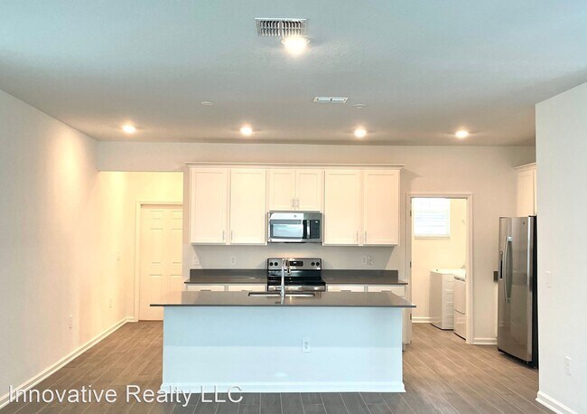 Building Photo - 3 br, 2.5 bath House - 2505 Relaxing Lane