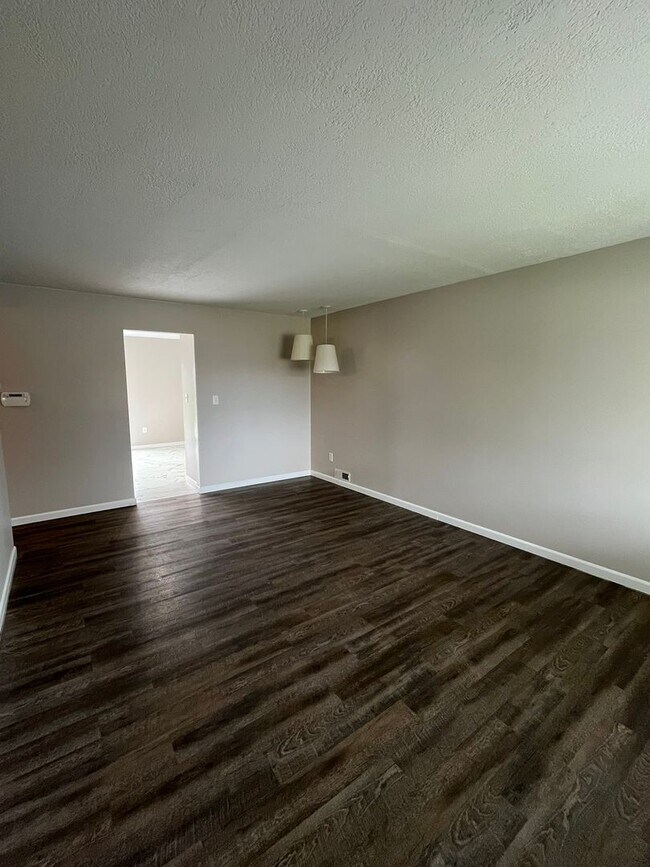 Building Photo - Spacious 3-Bedroom Ranch with 2-Car Garage & Oversized Fenced Backyard