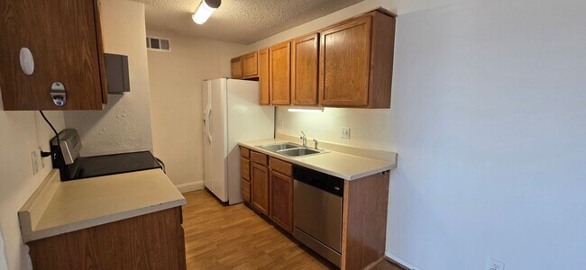Photo - Top-floor 2-bedroom, 1-bath condo in Thornton with lots of natural light.