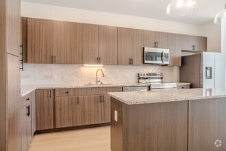 1BR, 1BA - 687 SF - Bluebonnet Kitchen 1 - Meridian at Wylie - 55+ Affordable Apartments