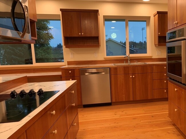 Custom kitchen with cherry cabinets and dishwasher - 1219 G Ave