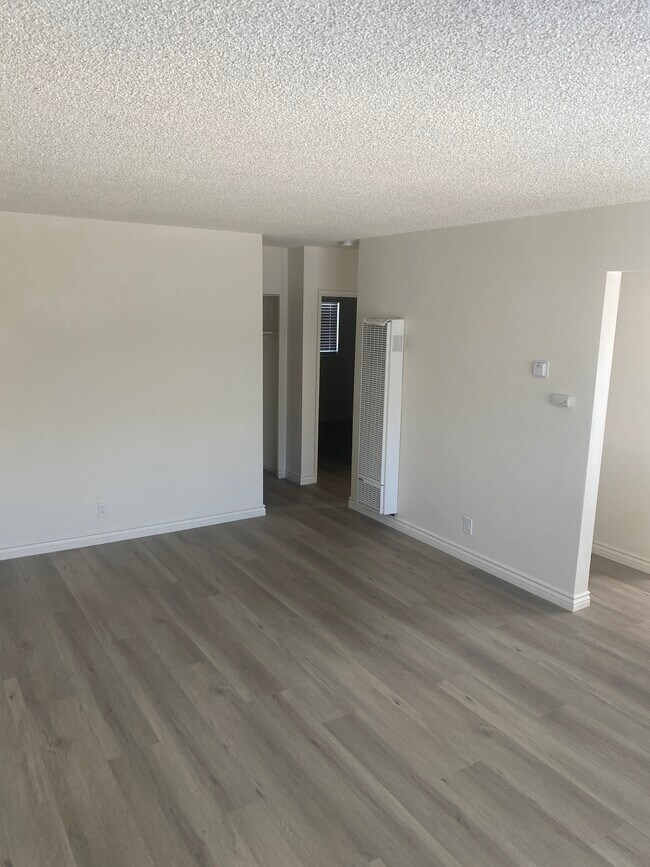 View of Living Room - New flooring throughout - 11656 Coldbrook Ave