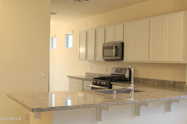 Building Photo - 5418 W Country Garden Ln