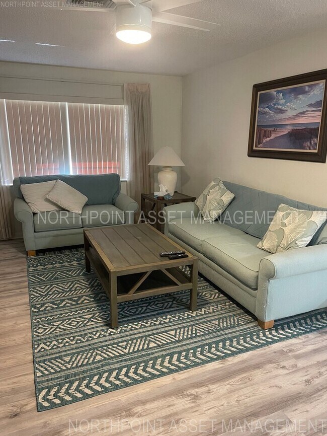Building Photo - Fully Furnished Golf Course Villa