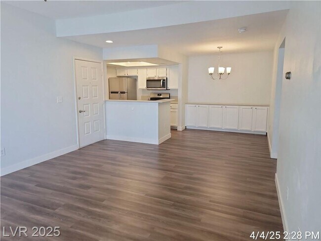 Building Photo - GORGEOUS 2ND FLOOR UNIT LOCATED IN GATED C...