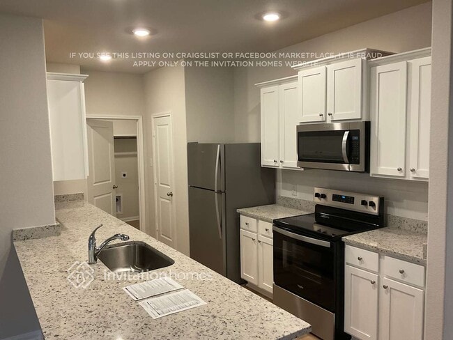 Foto del edificio - 8206 Blooming Meadow Ln