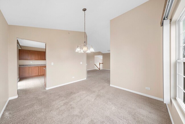 Foto del edificio - AUTUMN CREEK SECOND FLOOR CONDO WITH TWO CAR GARAGE