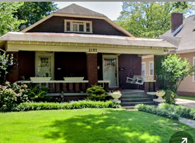 Both units have a front porch swing - 2157 Monroe Ave