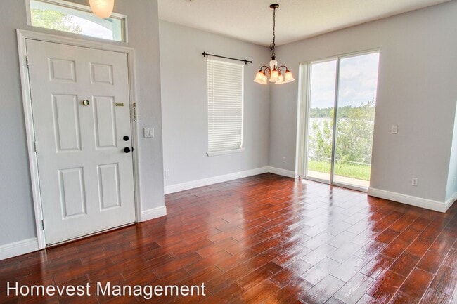 Building Photo - 3 br, 2.5 bath House - 10860 Derringer Drive