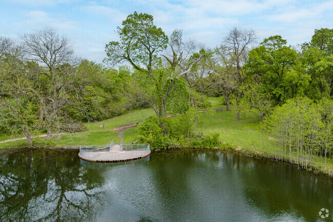 Bear Creek Nature Park features a large pond that provides habitat for fish, turtles, and other aquatic creatures.