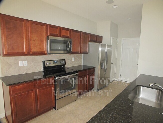 Foto del edificio - 10814 Derryrush Ave