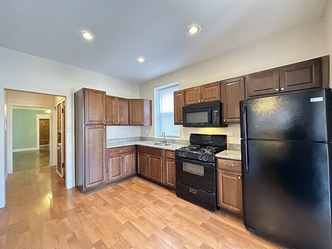 Foto del edificio - 5023 N Ridgeway Ave