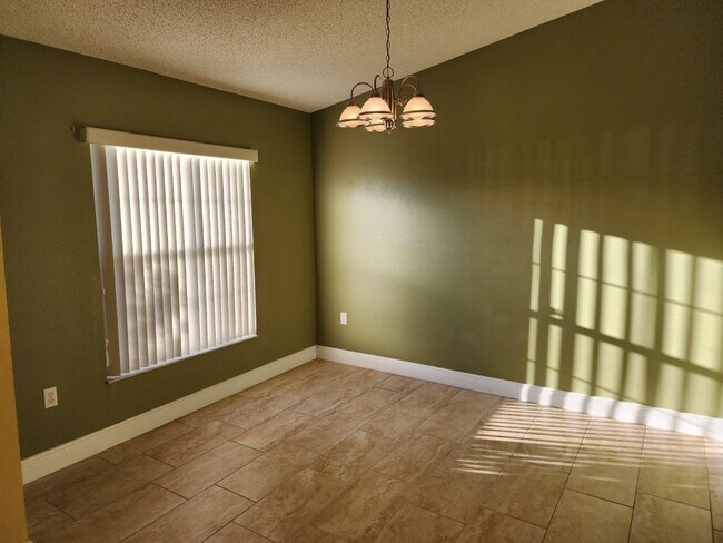 Building Photo - Large 4/2 Home With 2 Car Garage In Poinci...