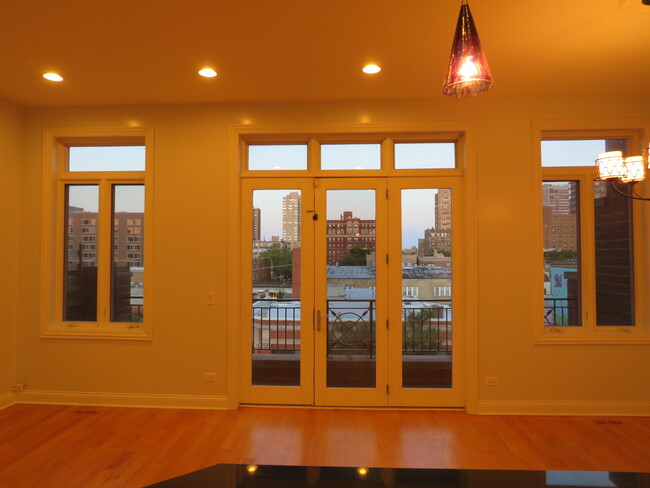 Living Room Balcony - 6260 N Broadway St