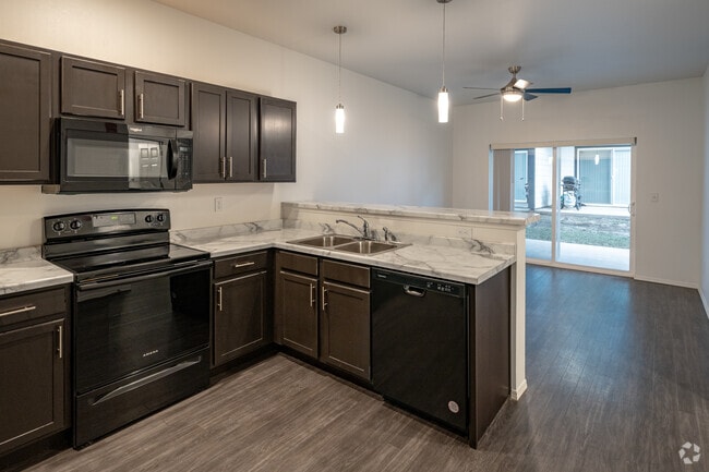 2BR, 2BA - 904SF - Kitchen/Living Room - The Altitude Flats
