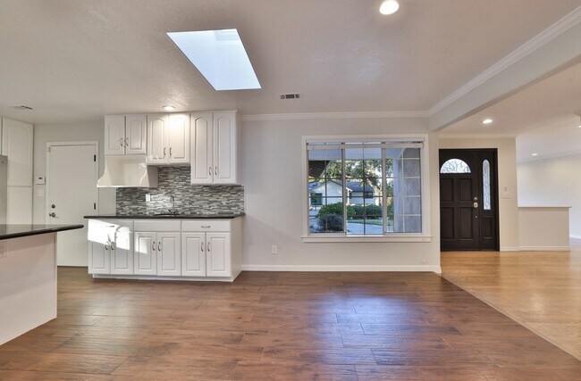 Building Photo - Bright 4BR Los Altos Retreat with Central A/C, Attached Garage & In-Unit Laundry