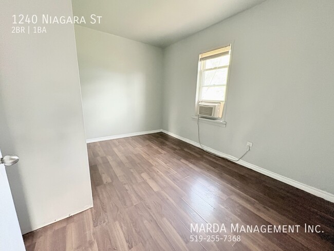 Building Photo - BRIGHT AND COZY 2BEDROOM/1BATH UPPER UNIT ...