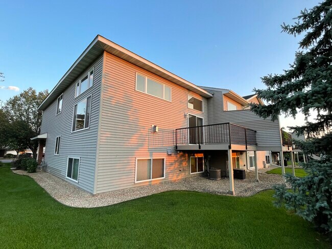 Side and back of the unit; Deck - 15115 Cimarron Ct
