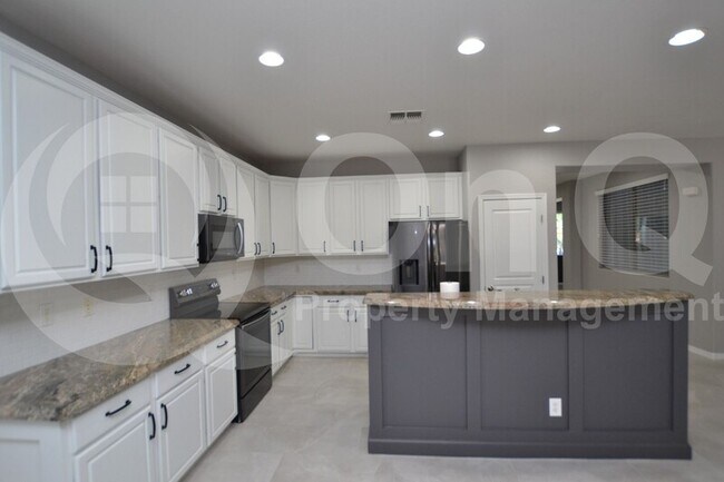 Building Photo - 21437 East Roundup Way