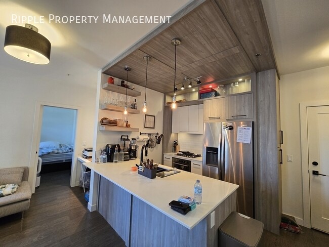 Building Photo - MODERN 2-BED, 2-BATH CONDO WITH CENTRAL A/C | PRIME SHAGANAPPI LOCATION