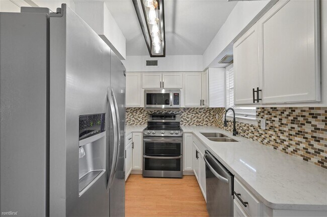 Building Photo - 2 br, 2 bath Condo - 5026 Matilda St Apt 117